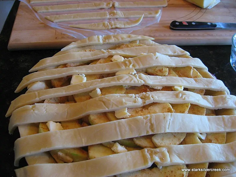 Take every second ribbon and place it on top of the apple pie.