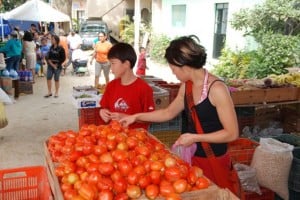 Buying tomatoes at the market
