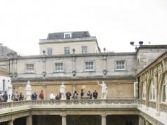 Drinking from the hot springs of The Roman Baths in England