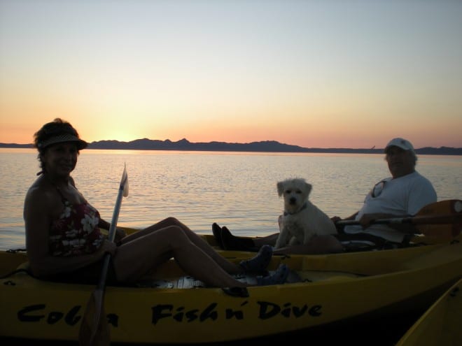 Ariel, Peter and Charlie in silhouette at sunrise