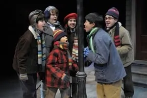 A Christmas Story: (l to r) Schwartz (Ali Molaei), Helen Weathers (Elara Rivers), Randy Parker (Emilio Fuentes), Esther Jane Alberry (Leah Kolchinsky) and Ralphie Parker (Garrett Meyer) are shocked as Flick’s (Nicolas Sancen) tongue sticks against the lamp post in San Jose Repertory Theatre’s A Christmas Story. Photo: Kevin Berne