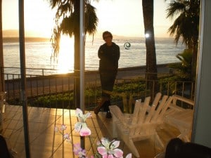 Sharon on the Balcony at the Estero Beach Hotel at Sunset