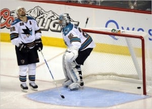 Dan Boyle and Evgeni Nabakov react after own goal.