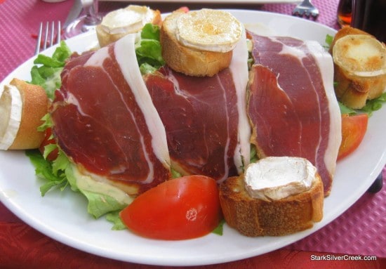 A salad which interestingly was covered with prosciutto, not a bad way to dress a salad. The surprisingly delicious part of this salad was the freshly toasted bread smeared with melted brie cheese. Yum!