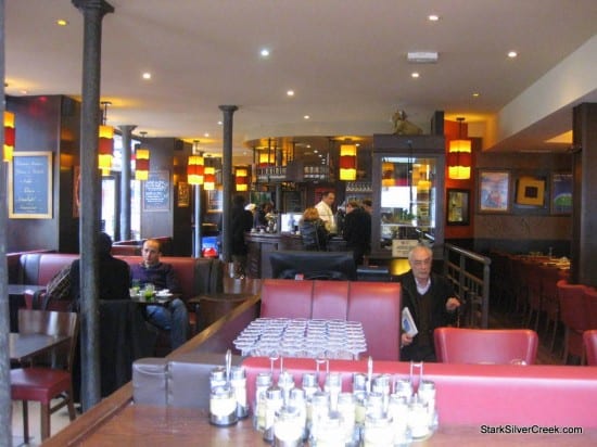 Inside the cafe. The seats are comfortable and the decor casual.