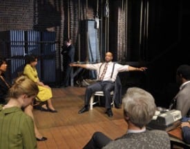 Sheldon (c. Rhonnie Washington*) recalls a lynching as cast and crew (clockwise from r, Jon Gentry*, Patrick Russell*, Tim Kniffin*, Melissa Quine, Elizabeth Carter*, Margo Hall*, Michael Ray Wisely*) look on in Trouble in Mind Photo by David Allen