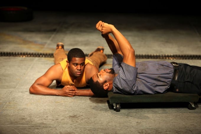 Tobie Windham and Joshua Elijah Reese as Oshoosi and Ogun Size in The Brothers Size at Magic Theatre. Written by Tarell Alvin McCraney, directed by Octavio Solis. Photo by Jennifer Reiley.