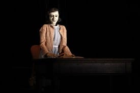 This marionette of Anne Frank is one of the fine puppets featured in the world-premiere production of Compulsion at Berkeley Repertory Theatre. Photographer: Joan Marcus