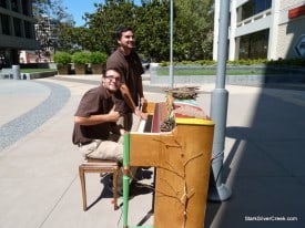 Performers try out one of the 16 street pianos in San Jose