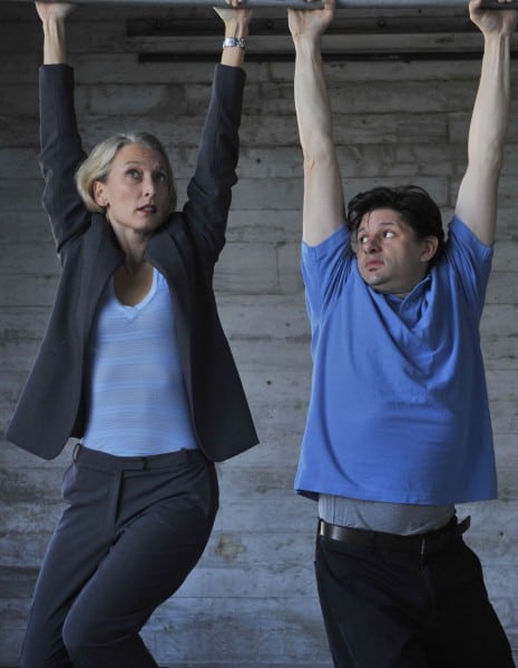 Hannah (l. Carrie Paff*) and David (r. Gabriel Marin*) hang from the edge of a bridge in the World Premiere of Collapse Photo by David Allen