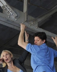 Hannah (l. Carrie Paff*) and David (r. Gabriel Marin*) hang from the edge of a bridge in the World Premiere of Collapse Photo by David Allen