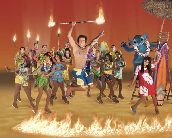 Lilo (bottom right) and Stitch (right back) celebrate a Hawiian luau with David (jumping, center) in Disney on Ice presents Let's Celebrate!