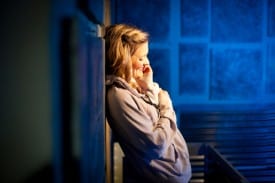Juliet (Luisa Frasconi) ponders her new love from her balcony in the Russian Mafia-themed Romeo and Juliet at Impact Theatre