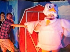 Emory (Charlie Cromer, middle) does a dance routine with his chicken friend Linda (Sarah Coykendall) as the narrator (Cindy Im) looks on in MilkMilkLemonade, a warped tale of innocence lost at Impact Theatre