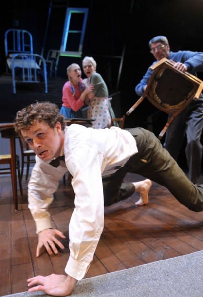 Gregor (front, Alexander Crowther) runs from his father (r. Allen McKelvey*) as his sister Grete and mother (c. l-r, Megan Trout, Madeline H.D. Brown) look on