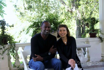 Brian McKnight and Loni Kao Stark post after a pre-show interview.