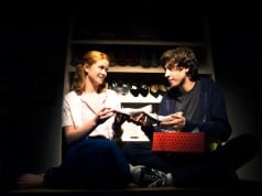 Sherri (Melissa Quine) and Zack (Jeremy Kahn) share truths in his mothers shoe closet.