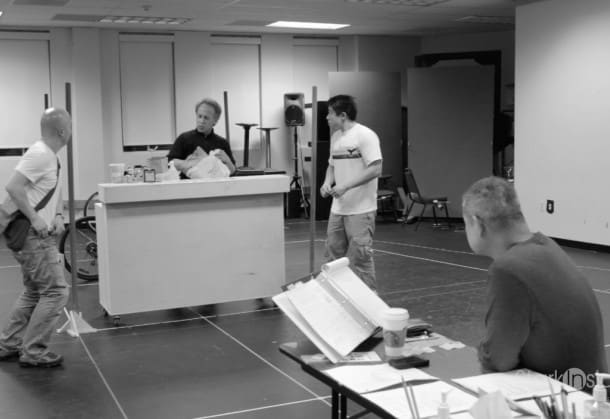 Director Chay Yew looks on as the cast of 'Stuck Elevator' rehearses. The show opens next moth at A.C.T. in San Francisco.