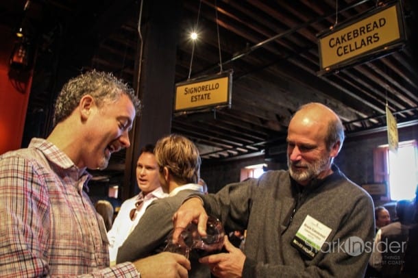 A scene from Premiere Napa Valley, an annual trade auction: Bruce Cakebread pours a 2010 Vaca Range Blend.