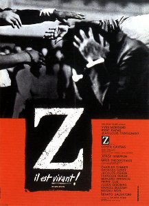 Poster of the legendary movie Z by Costa-Gavras, about the political assassination of Gregoris Lambrakis. "He is alive!" can be seen in the poster caption under the large Z, written in French, referring to the popular Greek protest slogan "Ζει" meaning "he (Lambrakis) lives".