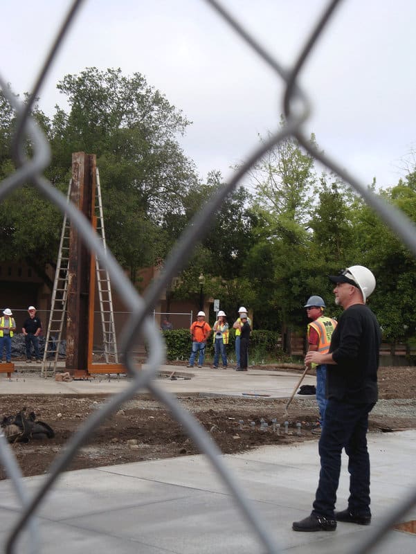 Artist Gordon Huether looks on during the installation of beams at the 9/11 Memorial in Napa.