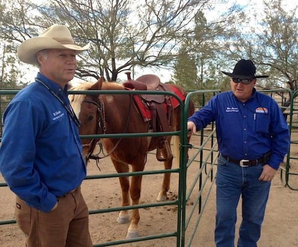 Pastor Randy, the horse-whisper, is on the left