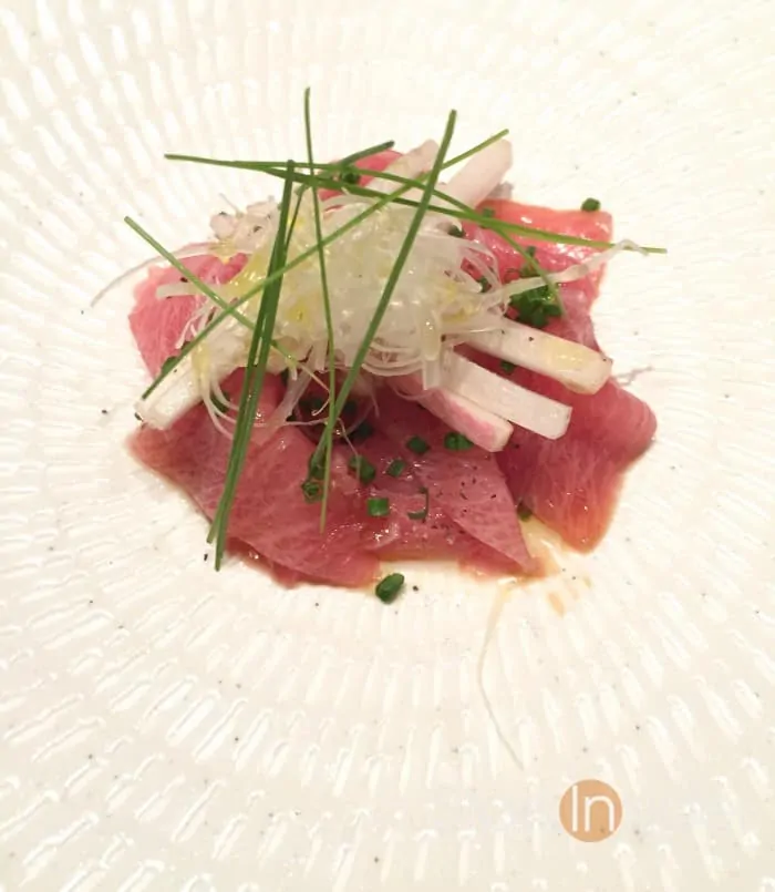 Carpaccio of Toro Tuna with Bitter Salad. When this dish was first introduced, Chef Jason, who was the chef in our room, noted it was tuna. It was clear from the fatty marbling and the melt in the mouth texture that it was toro. This was offset by the palate cleansing bitterness and crunch of the salad. 