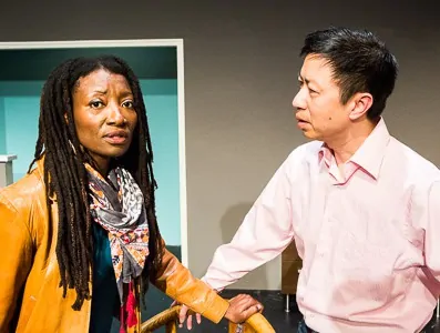 Pictured left to right: Nkechi Emeruwa as Rebecca and Hawlan Ng as Peter in THE CALL by Tanya Barfield Directed by Jon Wai-keung Lowe. A Theatre Rhinoceros Production at the Eureka Theatre. Photo by David Wilson. 