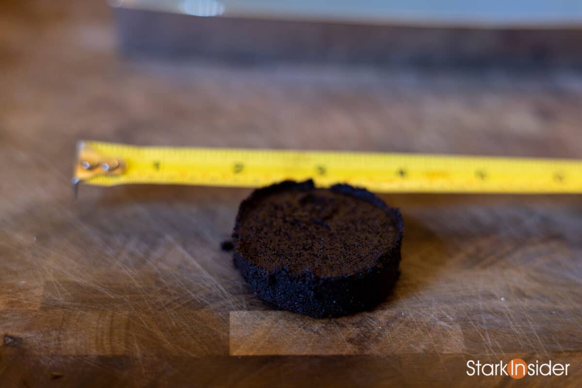 Examining a used espresso puck on the Jura Z10.