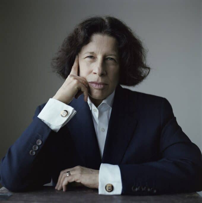 Lebowitz worked odd jobs, such as taxi driving, belt peddling, and apartment cleaning (“with a small specialty in Venetian blinds”), before being hired by Andy Warhol as a columnist for Interview. That was followed by a stint at Mademoiselle. Her first book, a collection of essays titled Metropolitan Life, was a bestseller, as was a second collection, Social Studies.