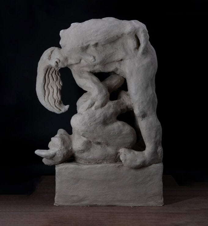To Train a Minotaur (2024) by Loni Stark. Porcelain. Photography by Clinton Stark. Porcelain sculpture titled To Train a Minotaur by Loni Stark. Abstract, mythological figure with intertwined limbs and contorted forms, rendered in raw, textured porcelain against a dark background.