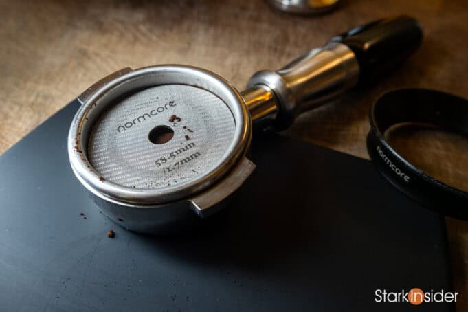 Freshly tamped espresso puck with level surface