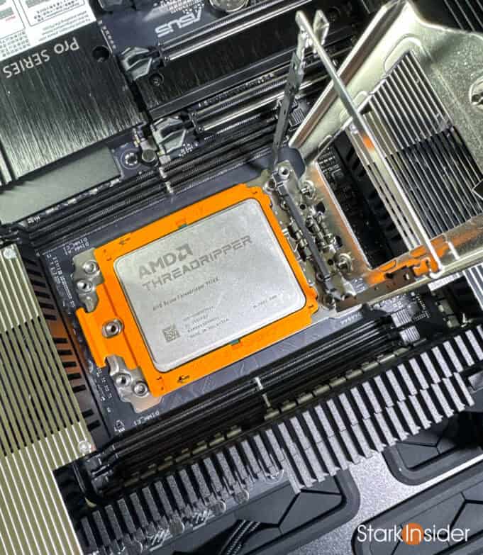 AMD Ryzen Threadripper CPU seated in ASUS TRX50 motherboard socket.