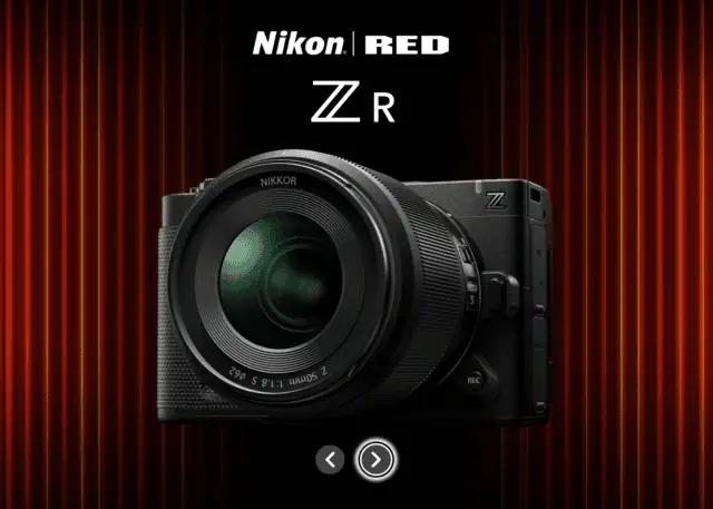 Nikon ZR cinema camera – Nikon and RED collaboration featuring full-frame body with NIKKOR Z lens against cinematic red curtain backdrop.