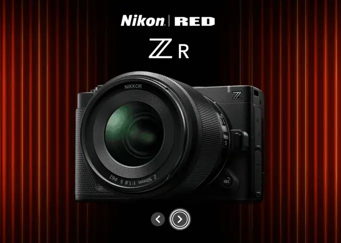 Nikon ZR cinema camera – Nikon and RED collaboration featuring full-frame body with NIKKOR Z lens against cinematic red curtain backdrop.