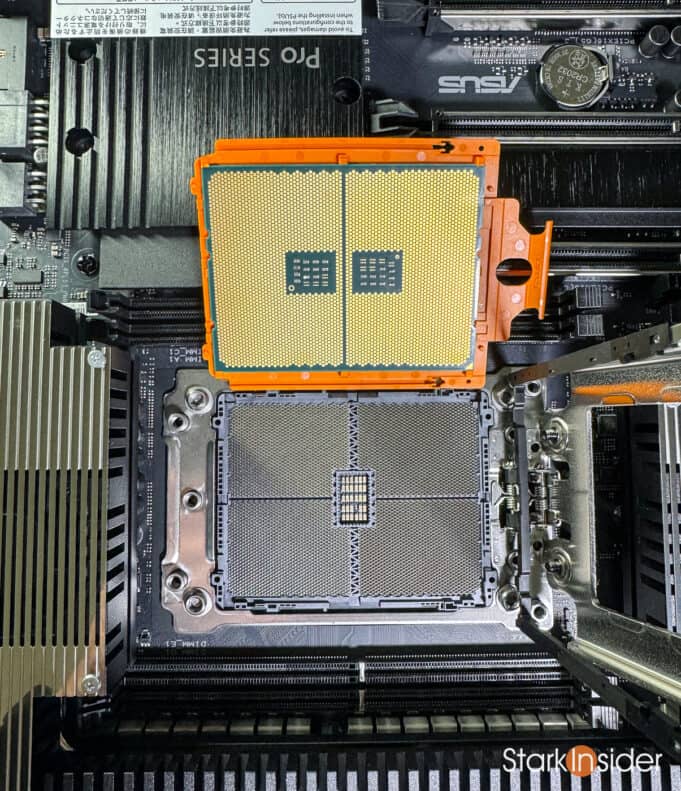 Counterfeit Threadripper held above TRX50 socket showing mismatched pins.