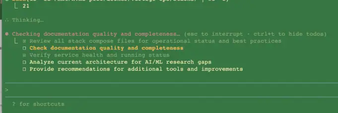 Code terminal showing AI-generated to-do list and progress tasks