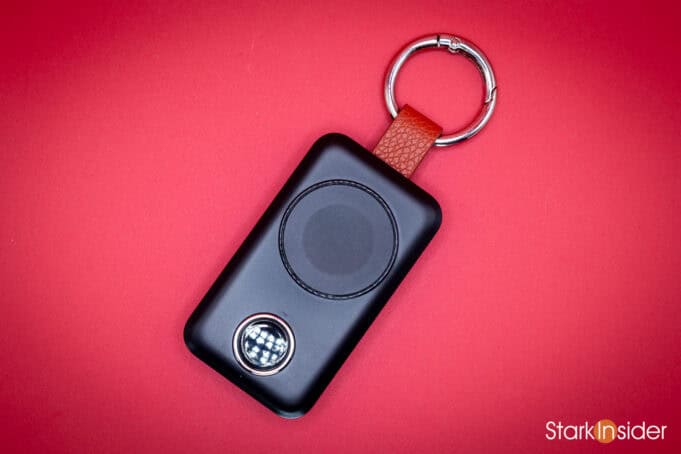 JOYROOM 2000mAh wireless Apple Watch keychain charger with leather attachment ring on red background