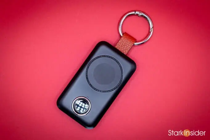 JOYROOM 2000mAh wireless Apple Watch keychain charger with leather attachment ring on red background