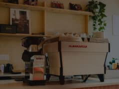 La Marzocco App Adds Smart Schedule and Local Mode La Marzocco espresso machine with Swan grinder on a home kitchen counter