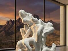 The Third Mind: Inviting Our AI Agents to Our Summit White sculptural tangle of human figures by Loni Stark in front of desert mountains at sunset, artwork for the Third Mind AI–human collaboration summit