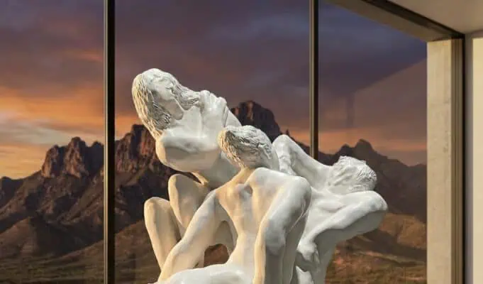 White sculptural tangle of human figures by Loni Stark in front of desert mountains at sunset, artwork for the Third Mind AI–human collaboration summit